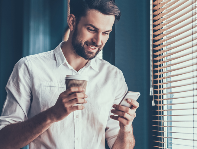 Young man looking at cell phone